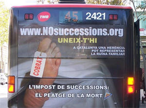 Autobús amb publicitat contra l'impost de successions · 