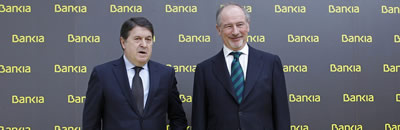 El president de Bankia, Rodrigo Rato, amb el vicepresident, José Luis Olivas, en la presentació de l'entitat (Foto: Reuters)