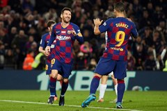 Leo Messi y Luis Suárez celebran uno gol con el Barcelona.